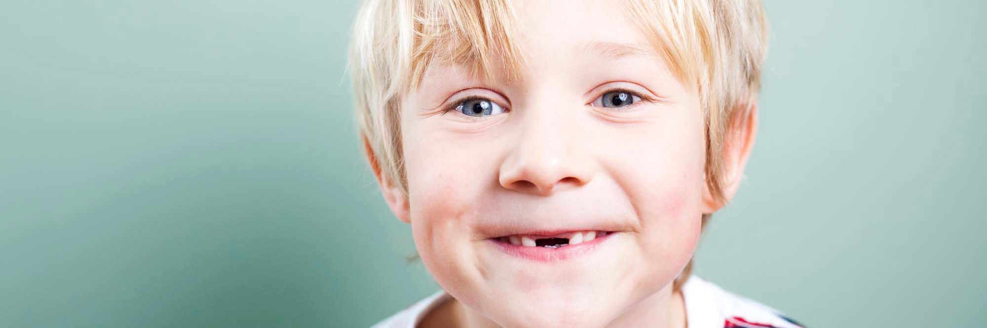 6-7 Years, 8-9 Years, Babies And Children, Blond Hair, Blue, Brightly Lit, Casual, Cheerful, Cheesy Grin, Child, Close-up, Copy Space, Cute, Elementary Age, Excitement, Gap, Happiness, Head And Shoulders, Horizontal, Human Teeth, Innocence, Isolated, Isolated Objects, Isolated On Blue, Lifestyle, Little Boys, Looking At Camera, Nerd, One Person, People, People, Portrait, Real People, Smiling, Toothless Smile, Turquoise