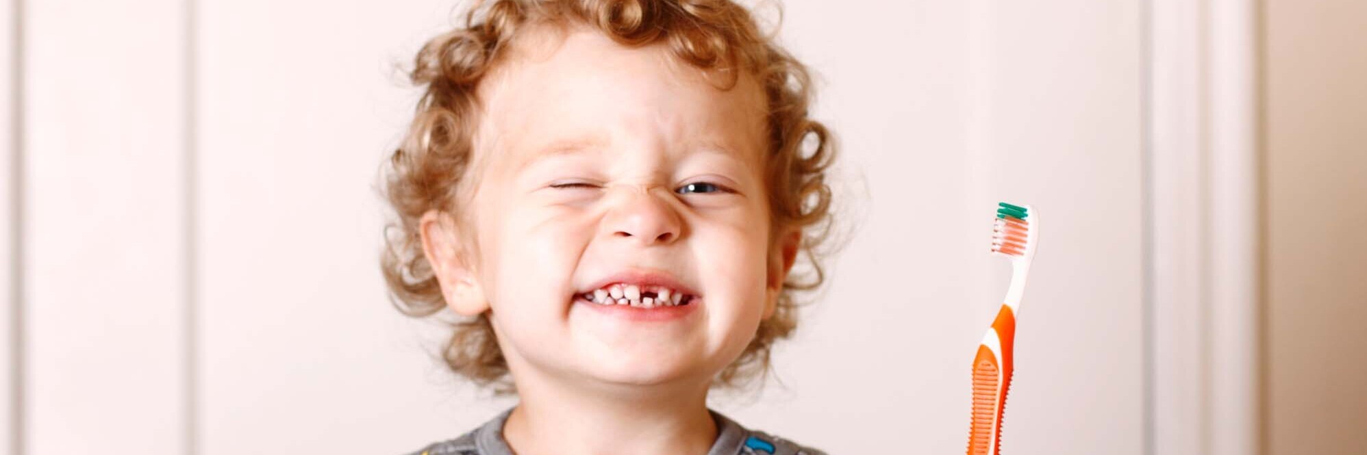 Cheesy Grin, Real People, Toddler, Preschool Age, Brushing Teeth, Bedtime, Morning, One Boy Only, Boys, Gap Toothed, Dental Health, Color Image, 15-18 Months, 2-3 Years, Child, Smiling, Getting Dressed, Caucasian Ethnicity, Preparation, Happiness, White, Looking At Camera, Horizontal, Cheerful, Blue Eyes, Human Teeth, Blond Hair, Curly Hair, Offspring, People, Night, Door, Domestic Bathroom, Toothbrush, Pajamas, Mirror, Lifestyle, People, Babies And Children